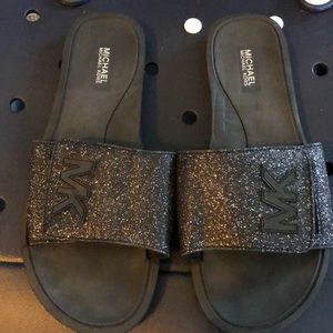 Michael Kora glitter black flip flops